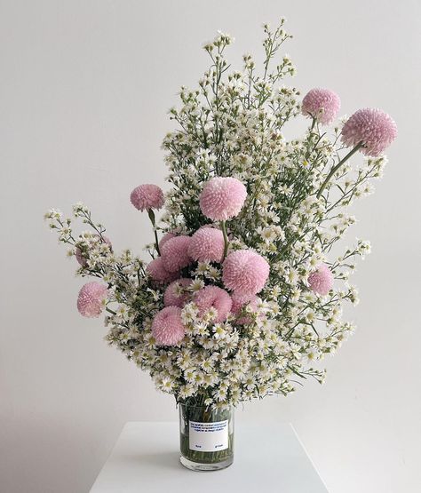 floral grotesk | The sequel A slightly pink rendition of the bigger sized local arrangement, dotted with pink pom pom chrysanthemums. Ask us for more… | Instagram Pink Chrysanthemum Bouquet, Chrysanthemum Arrangement, Pom Pom Chrysanthemum, Chrysanthemum Wedding Bouquet, Chrysanthemum Flower Arrangement, Pom Pom Bouquet, Fruit Flower Basket, Chrysanthemum Wedding, Chrysanthemum Bouquet