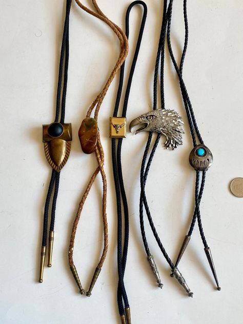 Vintage Rare Bolo Ties, Collectible Accessories, Western Native American Style Bolo Ties, Eagle Bear Paw Bolo Tie, Arrowhead Steer Bolo Tie. Various bolo ties: 1) Navajo Bear Paw Bolo Tie - Sterling silver Turquoise Stone - faux leather cord - great vintage condition - has mild tarnish (can be easily cleaned up); 2) Brown Semi-Precious Stone Bolo Tie - resembles brown agate but could easily be another stone - faux leather cord - great vintage condition - the string has minor wear; 3) Steer Bolo Tie Outfit, Accessory Inspo, Brown Agate, Bolo Ties, Native American Style, Stacked Necklaces, Bear Paw, Native Jewelry, Bear Paws