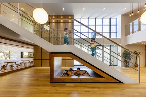 This modern kindergarten in Japan will make kids want to go to school - Architectural Digest Middle East Playgrounds Architecture, Kindergarten Interior, Kindergarten Design, Wooden Architecture, Kids Library, Bauhaus Design, Interior Stairs, Kids Play Area, Ball Pit