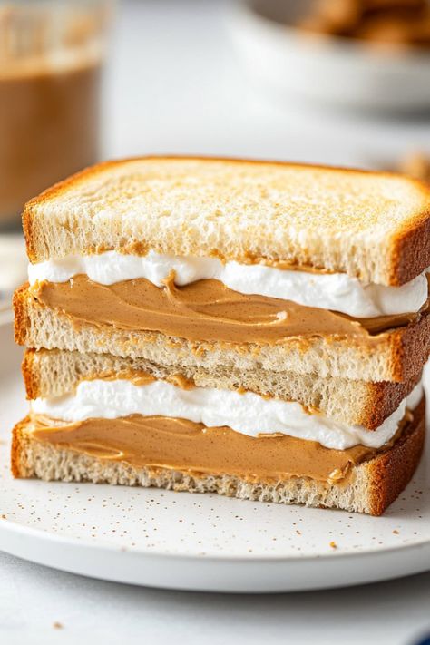 Fluffernutter Sandwich - Insanely Good Fluffernutter Sandwich, Vegetarian Marshmallows, Cousin Camp, Sack Lunch, Honey Wheat, Peanut Butter Honey, Grilled Sandwich, Marshmallow Fluff, Piece Of Bread