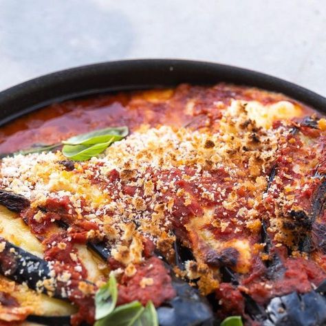 Silvia Colloca on Instagram: "Think eggplant parmigiana, but a lot easier and phenomenal in flavour!  Hassleback Eggplant Parmigiana  From my new show @silviasitalianmasterclass  Ingredients  2 large aubergines 600 ml of passata 200g @floridiacheese casalingo -or your melty cheese of choice) sliced into 1 pieces ½ cup fresh breadcrumbs ¼ cup (60ml) of extra-virgin olive oil salt and pepper for seasoning fresh basil, leaves picked to serve  Method  Preheat the oven to 180°C, fan 160°C. Cut lengthways slits into the aubergines about 1cm apart, leaving the stalk attached and taking care not to cut right down to the bottom  OR Pre heat your @oonihq pizza oven to 250C  Cut lengthways slits into the eggplants about 1cm apart, leaving the stalk attached and taking care not to cut right down to th Silvia Colloca, Eggplant Parmigiana, Melty Cheese, Basil Leaves, Pizza Oven, Fresh Basil, Extra Virgin, Bread Crumbs, New Shows