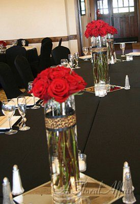 Centerpiece ideas Cheetah Print Centerpieces, Red And Leopard Party Decorations, Animal Print Centerpieces, Cheetah Centerpieces Ideas, Leopard Centerpieces, African Centerpieces, Cheetah Print Wedding, Roses Centerpieces, Cheetah Birthday Party