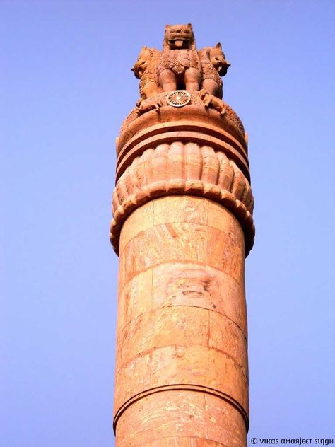 The national emblem of India and a mark of Emperor Ashoka's visit to Sarnath, the Ashoka Pillar crafted out of stone is an impressive structure with four lions at the top. This 50 m long pillar along with the Dhamek Stupa, are Ashoka's gift to Buddhism and the entire complex has a calm aura to it. A number of monks are spotted meditating around the compound. The entire complex is filled with lush green lawns, and along with the Stupa, they resemble a colony with the Ashoka Pillar. National Emblem Of India, Calm Aura, Ashoka Pillar, Golden Temple Amritsar, National Emblem, Visit India, Golden Temple, Leaning Tower Of Pisa, Tourist Attraction