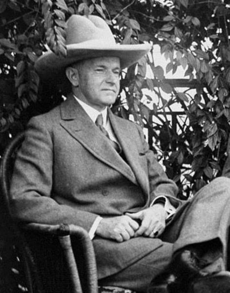 Here’s a picture of Calvin Coolidge in a giant hat. Not pictured? His companion, Curious George. 🐵😂 Calvin Coolidge, Instagram Recipes, Curious George, History, Instagram