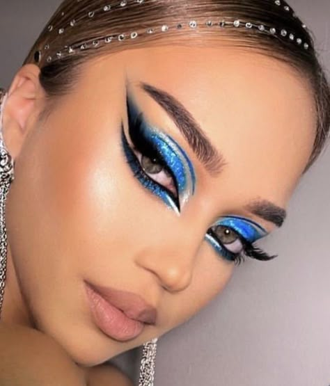 Gorgeous blue glitter eyeshadow look with killer smoked out liner with beautiful lashes. #makeupIdeas #makeuplooks #makeupinspiration #makeup Melbourne Cup Makeup, Ballroom Makeup Blue, Blue Dance Makeup, Freestyle Disco Dance Makeup, Blue Stage Makeup, Vegas Showgirl Makeup, Blue Bird Makeup, Blue Carnival Makeup, Dramatic Blue Eye Makeup