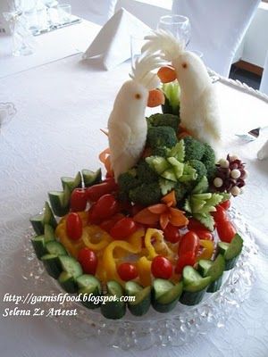 Fruit Carving - Vegetable Carving  - Fruit Carving Arrangements and Food Garnishes: Vegetable Plate And a Pair Of Carved Birds. Using Cucumber Garnishes Veggie Display, Food Garnish, Parrot Food, Vegetable Plate, Fruit And Veggie, Food Sculpture, Edible Creations, Fruit And Vegetable Carving, Creative Food Art