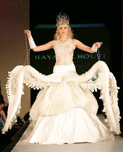 6 Crazy Wedding Dresses | The Inspired Bride  THE OCTOPUS ONE THO. IT SHALL BE. MY WEDDING DRESS (not really BUT COME ON). Weird Wedding Dress, Ugly Wedding Dress, Octopus Dress, Worst Wedding Dress, Unusual Wedding Dresses, Ugly Dresses, Funny Wedding Pictures, Crazy Dresses, Crazy Wedding