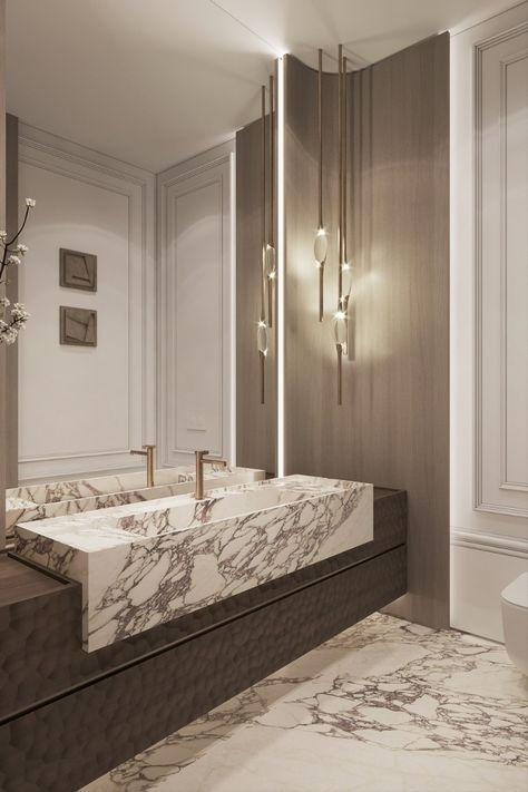 The stunning marble veining on the sink and flooring adds a touch of luxury, while the textured wooden panels bring warmth and depth. Onyx Marble Bathroom, Luxury Modern Bathroom, Villa Project, Luxxu Modern Design Living, Bathroom Design Trends, Powder Room Design, Serene Bedroom, Classic Interior Design, Transitional Modern