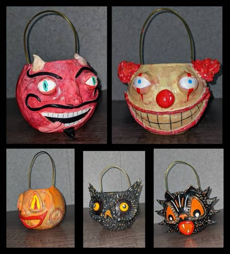 I have always loved the look of vintage paper mache trick-or-treat buckets. However, since they are so delicate there aren't many authentic ones left and those that are come at a hefty price.  So, a couple of months ago I decided to make my own! I make them Out of miniature glass fish bowls coated with paper mache. I then add facial features made of clay and other materials. Each bucket takes a minimum of 3 hours to make so I hope that explains the price!  These buckets are 4 Inches tall (with t Vintage Halloween Crafts, Trick Or Treat Bucket, Glass Fish Bowl, Vintage Paper Mache, Fish Bowls, Treat Bucket, Halloween Buckets, Frankenstein Halloween, Paper Mache Sculpture