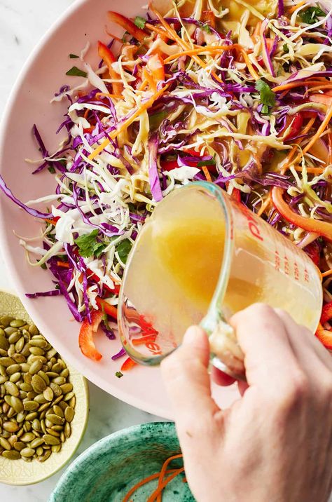 This shredded cabbage salad recipe is a healthy and delicious side dish! Tossed in an easy peanut dressing, it's colorful, crunchy, and full of bright flavor. Shredded Veggie Salad, Raw Cabbage Salad Recipes, Cabbage Salad Dressing Recipes, Raw Cabbage Recipes, Raw Cabbage Recipe, Cabbage Salad Dressing, Shredded Cabbage Recipes, Shredded Cabbage Salad, Shredded Salad