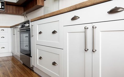 How to Protect a Kitchen Sink Cabinet from Water Damage | Today's Homeowner Shaker Cabinet Doors, Update Kitchen Cabinets, Paint Cabinets White, Custom Cabinet Doors, Clean Kitchen Cabinets, Update Cabinets, Refinishing Cabinets, Wood Kitchen Cabinets, Shaker Cabinets