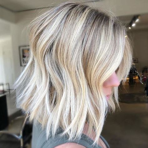 Blunt A-Line Lob - If the recent haircuts of style icons Celine Dion, Reese Witherspoon or Jennifer Lopez are any indication, long bobs - otherwise known as lobs – are in. #fall2019 #Fallhairtrends #hairtrends #lob #longbob Long Angled Bob, Medium Short Haircuts, Line Bob Haircut, Angled Bob Haircuts, Asymmetrical Bob Haircuts, Angled Bob Hairstyles, Cool Blonde Hair, High Rise Straight Jeans, Angled Bob