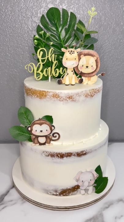 CakesbyEssie on TikTok Safari Cake Simple, Safari Themed Baby Shower Cake, Wild One Cake Ideas, Wild One Safari First Birthday Cake, Baby Shower Safari Cake, Safari Baby Shower Boy Cake, Cake Jungle Theme, Wild Animal Cake Jungle Theme, Blue Safari Cake