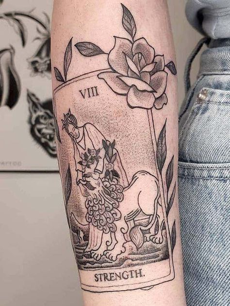 The Leo tarot card tattoo by @taurieslove- Bold statement Leo tattoos for men Leo Queen Tattoo, Leo Card Tattoo, Tarot Card Tattoo Design Strength, Leo Forearm Tattoo Women, Lion Tarot Card, Leo Tarot Card Tattoo, Unique Leo Tattoos For Women, Leo Tattoos Men, Leo Woman Tattoo