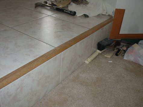 ceramic tile edging ideas | Need Ideas for raised foyer - Ceramic Tile Advice Forums - John Bridge ... Tiled Steps Indoor, Foyer Tile, Tiling Ideas, Tile Edge Trim, Stair Ideas, Tile Steps, Ceramic Floor Tile, Staircase Makeover, Tile Stairs