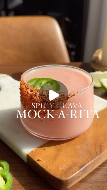 134K views · 13K likes | Nikki Sips 🤘🏻🍸 on Instagram: "Made this for the hundreds of sweet souls who asked for a mocktail version of my viral spicy guava margarita from last month.  She’s spicy, sweet, and frozen— you almost forget the alcohol is missing.  Happy Mocktail Monday my friends! 🫶🏼☺️☀️

____

Spicy Guava Mock-a-Rita

You’ll Need:
2 oz guava syrup (linked in Amazon storefront)
2 oz jalapeño infused pineapple juice (easy recipe below)
1 oz cream of coconut 
1 lime, juiced
Scoop of ice
Tajin (I am who I am)
Agave
2 jalapeño slices 

Prepare your glass by painting with agave and dipping into tajin.  In a blender, combine guava, lime juice, pineapple, cream of coconut, and ice.  Blend until smooth.  Pour into prepped glass and garnish with two jalapeño slices. ☀️🌶️

____

Jalap Spicy Guava Margarita, Spicy Mocktail Recipe, Guava Mocktail, Homemade Spirits, Guava Drink, Guava Syrup, Guava Margarita, Juice Pineapple, Cream Of Coconut