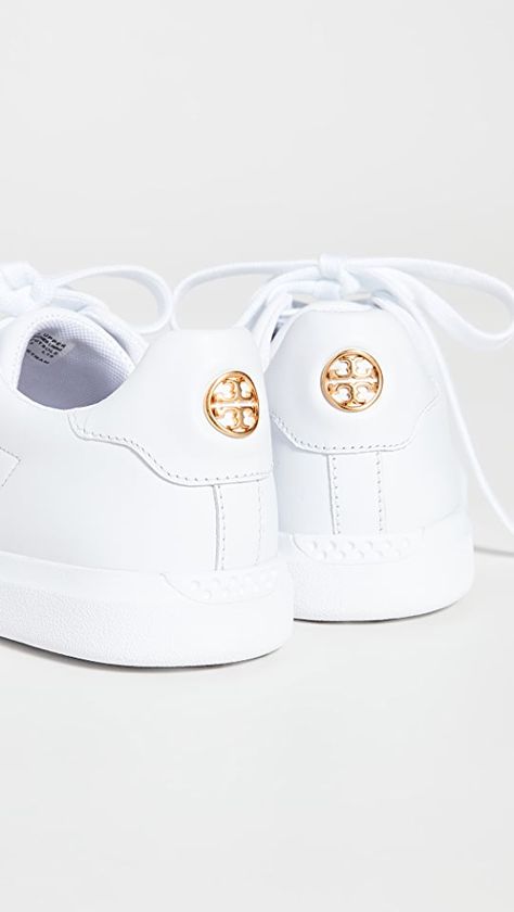 Tory Burch Howell Court Sneakers | SHOPBOP Gold Flats Outfit, Tori Burch Tennis Shoes, Tory Burch Howell Sneaker, Tory Burch Shoes Flats, Tory Burch Sneakers, Tory Burch Ballet Loafers, Tory Burch Ivory Bags, Flats Outfit, Classic American Style