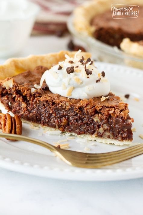 This German Chocolate Pie recipe idea comes straight from Amish country. The rich, gooey, chocolate filling it to die for! #germanchocolatepie #pierecipe #german #germanchocolate #chocolatepie #pie #dessert #amishpie #FavoriteFamilyRecipes #favfamilyrecipes #FavoriteRecipes #FamilyRecipes #recipes #recipe #food #cooking #HomeMade #RecipeIdeas German Chocolate Pie Recipe, German Chocolate Pecan Pie, German Chocolate Pie, German Chocolate Pies, Easy German Recipes, German Chocolate Brownies, Perfect Pie Crust Recipe, German Chocolate Cookies, Chocolate Pie Recipe