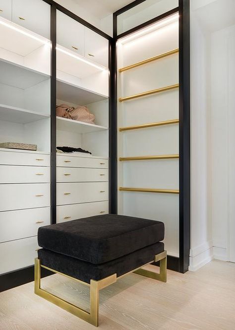 Izen Architecture - A black velvet stool finished with brass legs sits to the side of lighted stacked gold scarf rails mounted adjacent to white built-in dressers adorned with brass pulls and fixed beneath custom lit shelves and flat front cabinets. White Closet Ideas, Black And White Closet, Slanted Shoe Shelves, Bedroom Ideas Black, Gorgeous Closet, Contemporary Closet, Closet Island, Black Closet, Built In Dresser