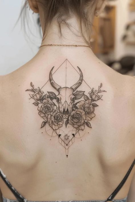 Cow Skull Tattoo with Flowers: Top Ideas and Designs Cow Skull Spine Tattoo, Cow Skull Tattoo, Skull Thigh Tattoos, Cow Skull Tattoos, Bull Skull Tattoos, Tattoo With Flowers, Floral Back Tattoos, Skull Hand Tattoo, Skeleton Tattoos