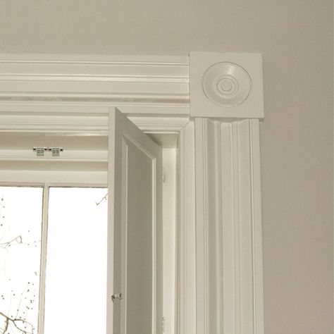 More original details from a new project... Elegant but simple carpentry is found throughout this historic home. The raised panel colonial shutters were originally designed to block out the heat and provide privacy and corner rosettes add a special touch. #historicHome #carpentry #SouthofBroad Square Quarter Round Trim, Window Trim With Rosettes, Greek Revival Window Trim, Rectangle Rosette Door Knob, Colonial Shutters, Rosette Trim, Raised Panel, Door Trims, Historic Home