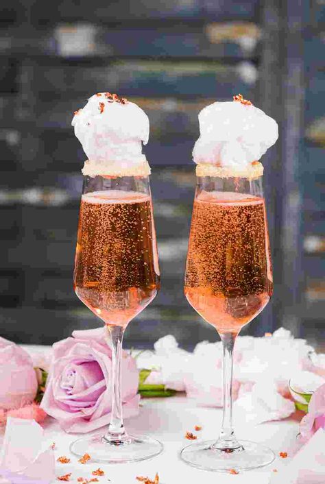 Cotton Candy Champagne Recipe | Cozymeal Cotton Candy Prosecco, Champagne And Cotton Candy, Drinks With Champagne, Cotton Candy Dessert, Cotton Candy Christmas, Cotton Candy Martini, Cotton Candy Drinks, Champagne Recipe, Cotton Candy Champagne