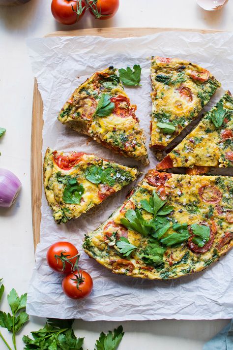 This late summer frittata with tomatoes and fresh herbs has been my go-to egg dish pretty much since it’s been warm enough to wear sandals! Made with good-for-you pasture raised eggs, ripe summer tomatoes, savory caramelized shallots, spinach, and fresh parsley for some seriously delicious flavor – it’s a must try!   There is something… Caramelized Shallots, Easy Summer Dinners, Pasture Raised Eggs, Frittata Recipes, Vegetarian Paleo, Egg Dish, Dinner Salads, Summer Dinner, Grilled Vegetables