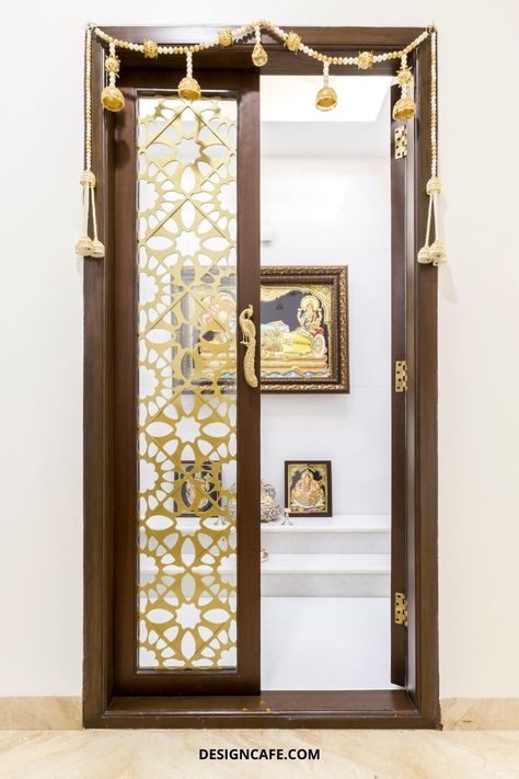 Pooja Room Door Design Ideas For Your Divine Dwelling Pooja Room Gate Design, Puja Room Gate Design, Pooja Room Glass Door Design Indian, Pooja Room Glass Door Design Modern, Pooja Door Design Indian Homes, Prayer Room Door, Puja Room Door Design Indian Modern, Puja Room Door Design, Pooja Room Door Design Modern