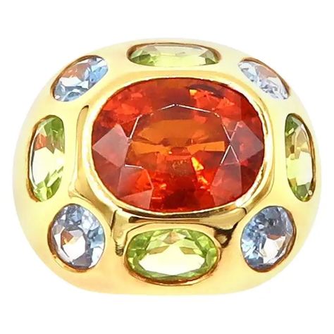 For Sale on 1stDibs - Spessatite 18K Yellow Gold Cocktail Ring embellished with Peridot and Blue Topaz in the Colours of Antelope Valley Blooming Fiery Poppy Fields Should you Antelope Valley, Amethyst Cocktail Ring, Yellow Gold Cocktail Ring, Poppy Fields, Gold Cocktail Ring, Contemporary Ring, Gold Cocktail, Pink Topaz, Modern Ring