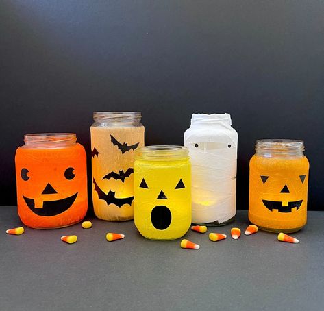 Easy, Spooky Recycled Jar Halloween Lanterns — super make it Recycle Material, Crepe Paper Streamers, Yarn Hanging, Battery Operated Tea Lights, Black Construction Paper, Paper Streamers, Halloween Lanterns, Jar Lanterns, Extra Yarn