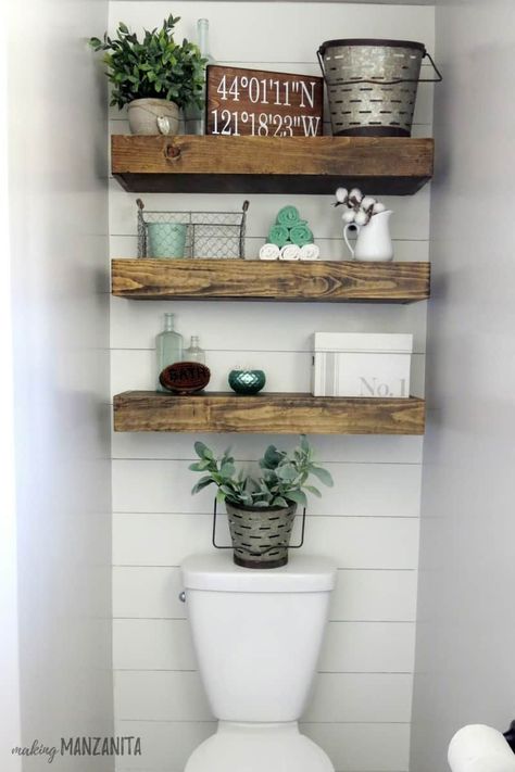 Farmhouse bathroom with wood floating shelves above toilet with shiplap accent wall #bathrooms #shelves #home #decor #designs #ideas Shelves Above Toilet, Farmhouse Bathroom Remodel, Shiplap Accent Wall, Faux Shiplap, Bathroom Farmhouse Style, Decor Ikea, Bad Inspiration, Bathroom Storage Shelves, Wood Floating Shelves