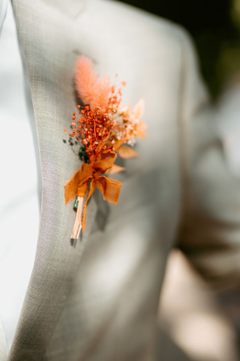 Delicate and dainty orange wedding buttonhole accessory for groom with dried flowers tied with orange ribbon | wedding buttonholes | wedding boutonnniere | Federica Mazzieri Pink And Orange Wedding Theme, White Buttonhole, Buttonholes Wedding, Pink And Orange Wedding, Orange Wedding Theme, Wedding Buttonholes, Orange Wedding Themes, Buttonhole Flowers, Button Holes Wedding