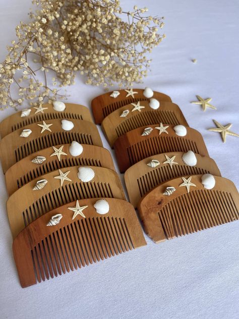 Bridal Shower Favors | Hair Combs Wedding Favors | Wedding Favors with Sea decors | Bridal Shower Gift for Guests | Beach Theme Party Favors Hair combs with beach decor are the best bridal shower gifts ever! These are so adorable and good quality wood type. I am pretty sure that your guests are going to ask where did you get this from! These beach decors are real and not plastic at all. I ship with UPS and FEDEX express shipping which takes 3-5 business days. Process time is 1 or 2 days. Feel fr Beach Bridal Shower Favors, Hair Combs Wedding, Beach Theme Gifts, Beach Theme Party, Best Bridal Shower Gift, Mermaid Bachelorette, Gift For Guests, Dream Beach Wedding, Beach Bridal Showers