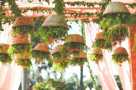 Photo of suspended cane baskets with floral decor over the mandap Cane Baskets Decoration Ideas, Decor With Baskets, Cafe Design Inspiration, Long Table Wedding, Cane Baskets, Selfie Wall, Marriage Decoration, Wedding Backdrop Design, Mehndi Decor