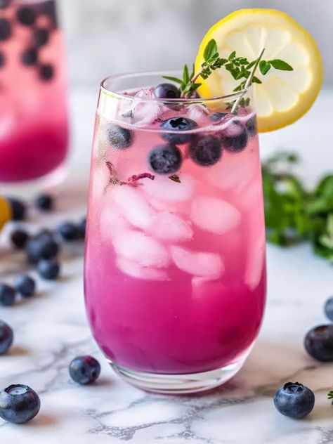 This thirst-quenching Blueberry Lavender Lemonade is the ultimate summer refreshment! Packed with antioxidants, it aids digestion and helps relieve stress. �🍇💆‍♀️ Click the pin for the full recipe and enjoy a glass of this delicious and nutritious summer drink. Cheers to staying refreshed, relaxed, and hydrated! 🍹💧 #summerdrink #refreshing #healthybeverage #antioxidants #lowcalorie For more amazing recipes, follow @silverforkglutenfree on Pinterest! 🌟 Virgin Summer Drinks, Blueberry Lavender Lemonade, Healthy Summer Drinks, Gluten Free Drinks, Blueberry Lavender, Culinary Lavender, Lemonade Cocktail, Blueberry Lemonade, Lavender Lemonade