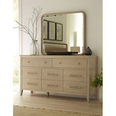 This versatile wall mirror offers dual functionality, designed to be mounted on a dresser or hung on your wall. It's made with a solid rubberwood frame that's simple and unadorned, allowing it to blend seamlessly with various decor styles from traditional to coastal. The beveled glass adds a subtle touch of elegance to your space. This mirror comes with hardware for dresser mounting in a horizontal orientation and keyhole brackets for wall mounting in either orientation (additional hardware requ Double Dresser In Bedroom, Horizontal Dresser, Townhome Decor, Townhome Decorating, Transitional Dresser, Bedroom Furniture Ideas, Stylish Mirror, 8 Drawer Dresser, 9 Drawer Dresser