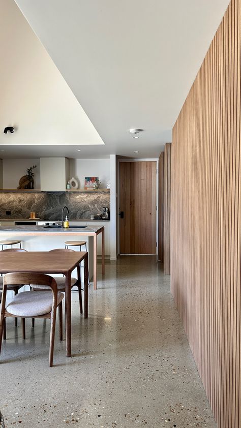 Polished concrete floors and timber feature wall Japandi Concrete Floor, Concrete Floor Decor, Pink Concrete Floor, Concrete Floor House, Polished Concrete Floor Kitchen, Poured Concrete Floor, Concrete Shed, Concrete Floor Ideas, Concrete Floor Kitchen