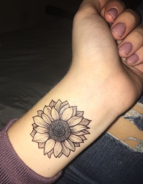 Sunflower tattoo Sunflower Wrist Tattoo, Sunflower Tattoo On Wrist, Couple Tats, Sunflower Tattoo Shoulder, Wrist Tattoo Ideas, Work Tattoo, Foot Tattoos For Women, Tattoos For Women Flowers, Bff Tattoos