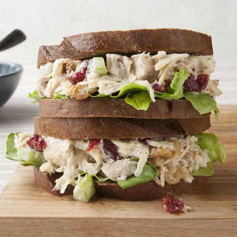 I made these simple yet special cranberry walnut chicken salad sandwiches for a birthday party. Tangy cranberries and crunchy celery pep up the chicken. Leftover turkey works well, too. —Shannon Tucker, Land O' Lakes, Florida Cranberry Walnut Chicken Salad, Vegan Chicken Salad, Cold Sandwich Recipes, Walnut Chicken Salad, Salad Sandwich Recipe, Walnut Chicken, Cranberry Chicken Salad, Chicken Salad Sandwich Recipe, Chicken Salad With Grapes