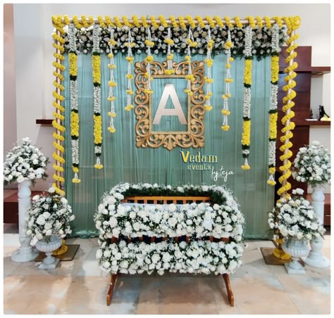 Traditional Decoration For Naming Ceremony, Barasala Backdrop Decoration At Home, Barsa Decoration Ideas, Vuyyala Function Decoration, Backdrop For Naming Ceremony, Dhoti Function Decoration Ideas, Cradling Ceremony Decoration, Namakarnam Decoration, Uyala Function Decoration