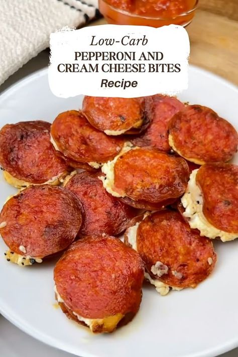 Indulge in the ultimate keto-friendly snack with our Cheesy Keto Pepperoni Bites. Each bite-sized morsel is bursting with the bold flavors of pepperoni and the creamy richness of cheese, all wrapped up in a crispy crust that's sure to delight. Perfect for your party platter or as a quick snack to satisfy those savory cravings. Make these irresistible bites your new snacking staple and share your joy with #KetoPepperoniBites #CreamCheeseCravings #KetoSnackTime #LowCarbLove Crispy Pepperoni Bites, Keto Pizza Muffins Recipe, Healthy Hearty Snacks, Healthy Pepperoni Snacks, Cheese Keto Snacks, Keto Apps And Snacks, Pepperoni Bites Appetizers, Keto Pepperoni Bites, Keto Salami Recipes