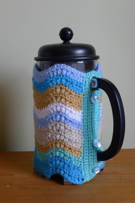 Here it is as promised. My earlier cafetière cosies were made very quickly just to try out basic  ripple, granny stripe and adding beads. This time I took more time and more care with the making. I… Kitchen Crochet, Granny Stripe, Tea Cozies, Tea Cosies, Bottle Covers, Crochet Rainbow, Cleaning Items, Mug Cozy, Crochet Kitchen