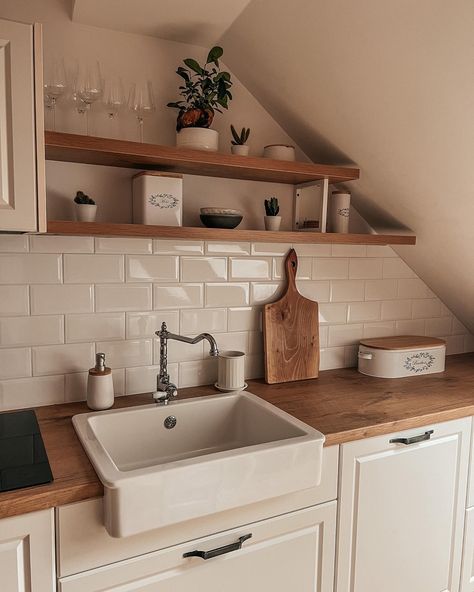 Cozy farmhouse style kitchen with white tiles and deep sink. Wood and cream colours Kitchen With White Tiles, Wood Worktop Kitchen, Farmhouse Cozy, Wood Countertops Kitchen, Diy Upholstery, Country Cottage Kitchen, Deep Sink, Cosy Kitchen, Upholstery Projects