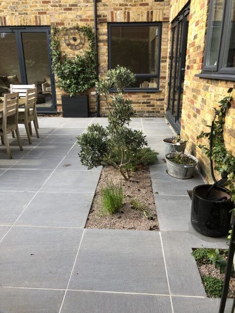 Grey Garden Patio, Outdoor Paving Ideas Courtyards, Garden Paving Ideas Cheap, Grey Porcelain Paving, Grey Patio Paving, Backyard Paving Ideas, Outdoor Paving Ideas, Small Garden With Shed, Garden Patio Ideas Paving