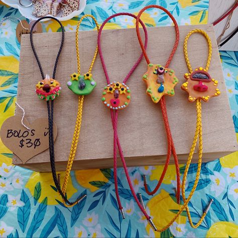 Funky bolo ties made with polymer clay 💛 ig: fossilandflora Clay Bolo Tie, Polymer Clay Bolo Ties, Roanoke Virginia, Bolo Ties, Bolo Tie, Bits And Bobs, Sticker Shop, To Do List, Fossil