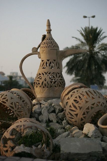 bahrain pottery. Though Mesopotamian, later potteries discovered indicated that they were created in Bahrain. Archaeologists have traditionally agreed that the earliest potteries made in the islands were made in 2300 BC. Potteries are still made traditionally in villages, particularly A'ali village which utilises the mud from the nearby flats in Riffa. Pakistani Pottery, Bahrain Travel, Pakistani Restaurant, Manama Bahrain, Kingdom Of Bahrain, Middle Eastern Culture, Manama, Arabian Nights, Pottery Making