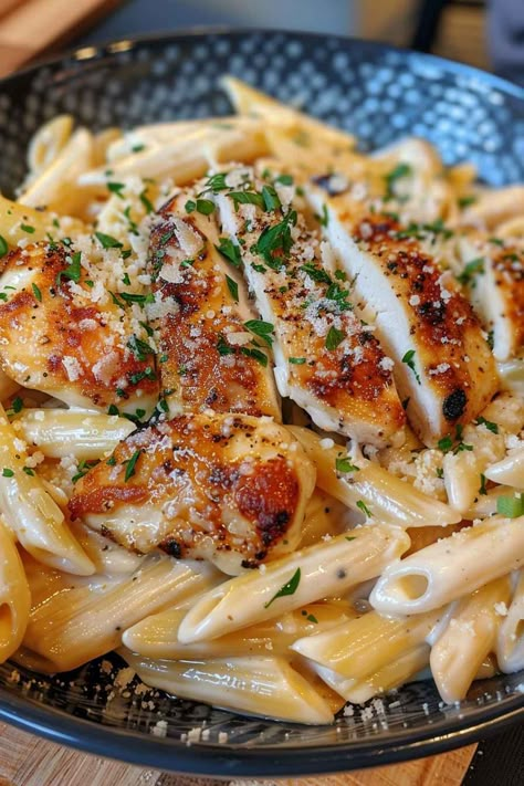 This Creamy Parmesan Chicken with Penne is the perfect weeknight dinner! Tender chicken, penne pasta, and a rich Parmesan cream sauce come together in just 30 minutes for a delicious meal that everyone will love. Easy to make, family-friendly, and packed with flavor, it's a dish you'll want to make again and again. Save this pin and try it for dinner tonight! Italian Recipes Easy Dinners, Pasta Dishes Recipes Chicken, Chicken Parmesan Penne Pasta, Chicken Tenderloin Recipes With Pasta, Chicken Parm And Pasta, Chicken Pasta Cream Sauce, Noodles And Company Parmesan Chicken, Crispy Chicken And Pasta, Roommate Dinner Ideas