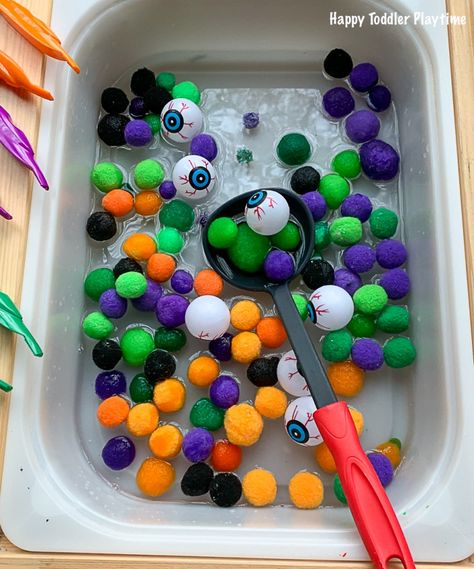 Eyeballs & Pom Pom Sensory Soup - Happy Toddler Playtime Halloween Sensory Game, Halloween Toddler Sensory, Eyeball Sensory Bin, Halloween Sensory Box Game, Halloween Spaghetti Sensory Bin, Pirate Week, Fiesta Halloween, Toddler Sensory Bins, Eye Balls