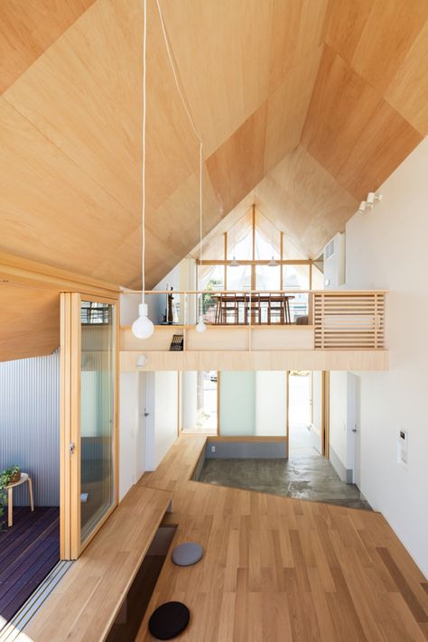 hiroto kawaguchi+kohei yukawa's wood-clad newtown house overlooks the picturesque japanese landscape Japanese Minimalist, Attic House, Japanese Interior Design, Interior Minimalista, Minimalist Home Interior, Small Apartment Living Room, Attic Renovation, Attic Storage, Attic Remodel