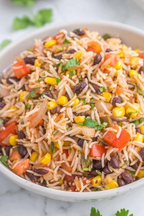 Mexican Fried Rice is a flavourful side dish loaded with onions, tomatoes, corn, black beans and salsa. Mexican Fried Rice, Tasty Fried Rice, Rice With Corn, Meal Sides, Grain Dishes, Rice Dishes Recipes, Latin Dishes, Southwest Recipes, Steak And Rice